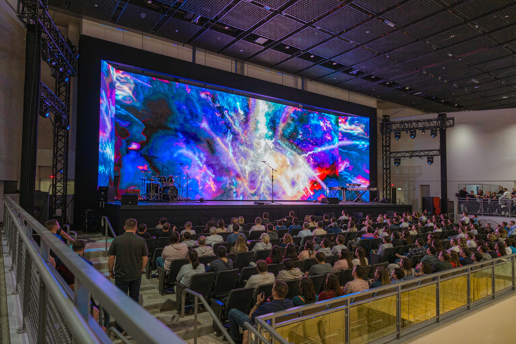 Church LED wall viewed from a side balcony showing consistent color and brightness at wide viewing angles