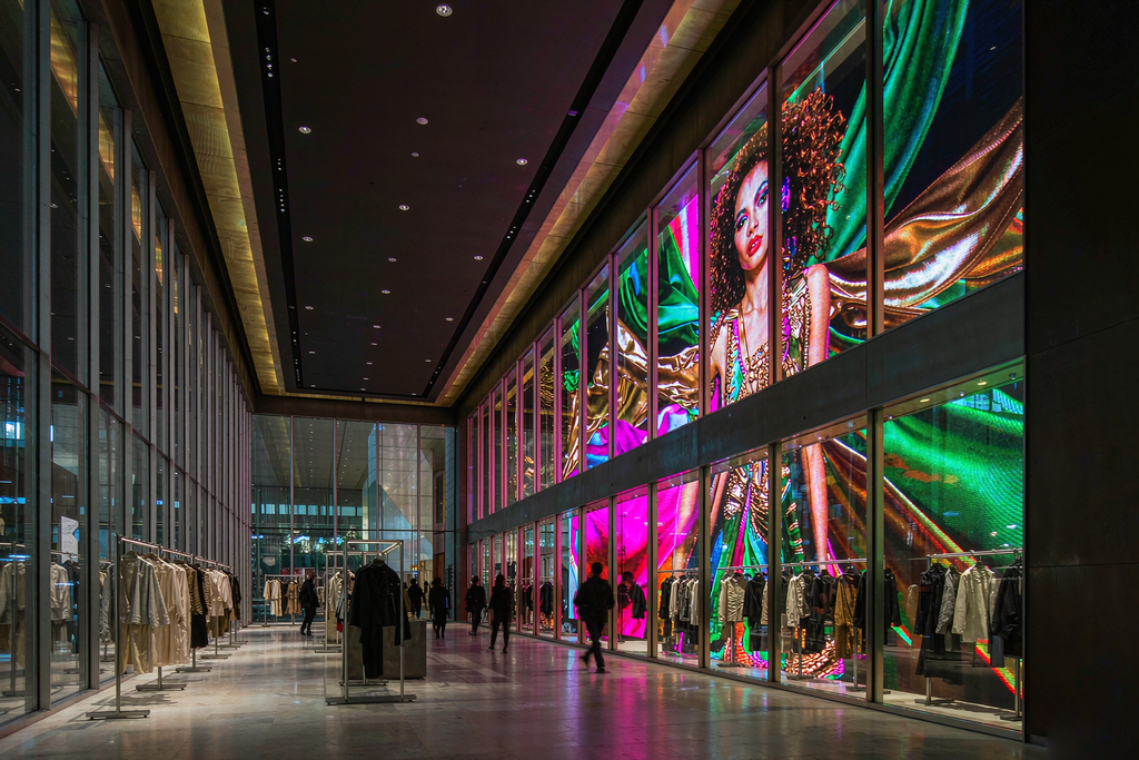 Fashion flagship store with a two-story micro LED screen showing ultra-saturated colors covering over 110 percent of BT.2020